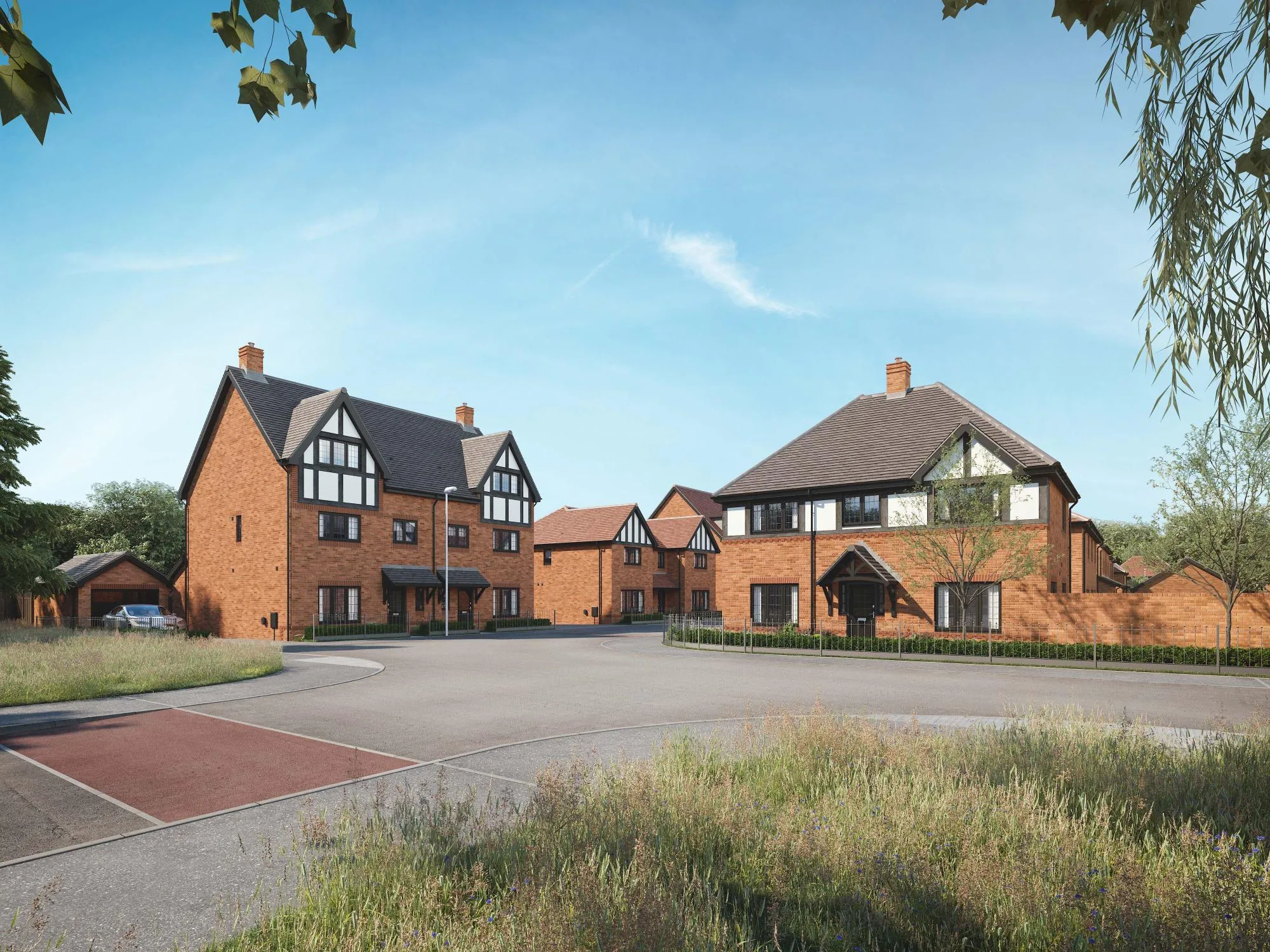 A picturesque neighbourhood featuring Anwyl Homes' new build homes, characterised by red brick and Tudor-style elements, set amidst well-maintained lawns and framed by a clear blue sky.